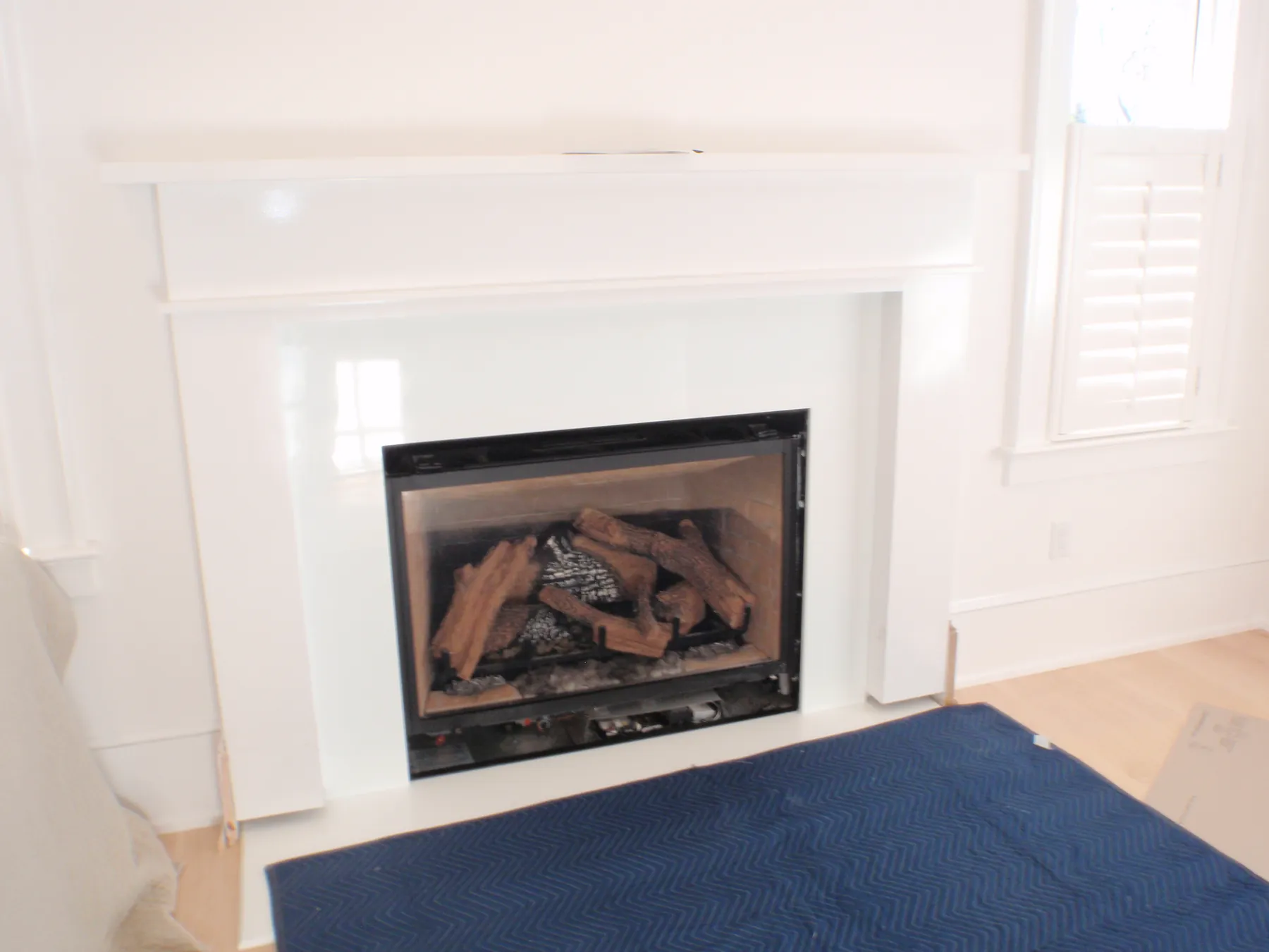 White stone fireplace surround